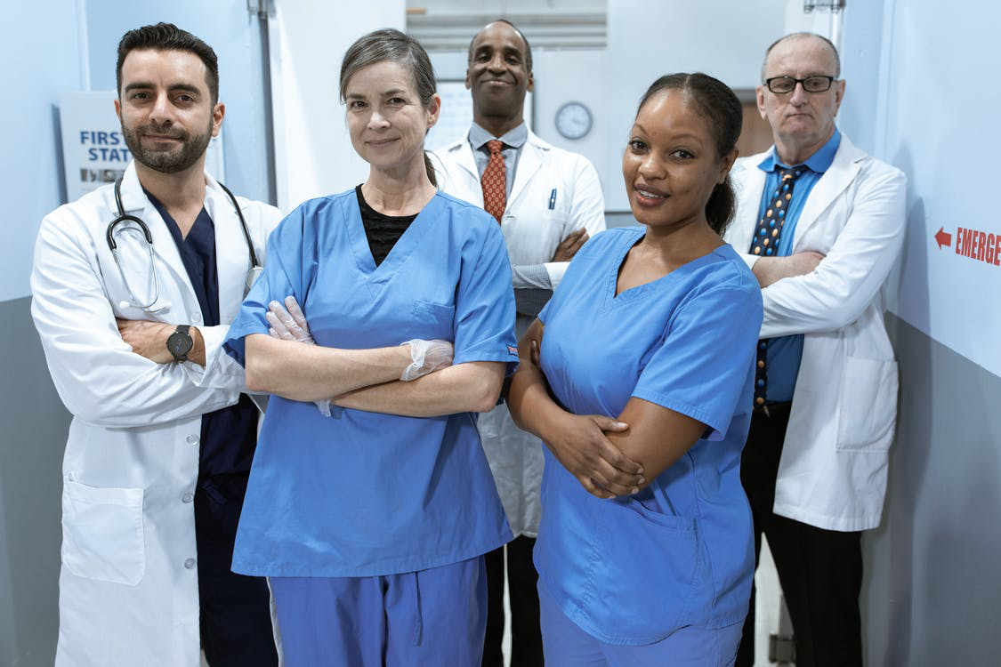 A team of healthcare professionals standing together 