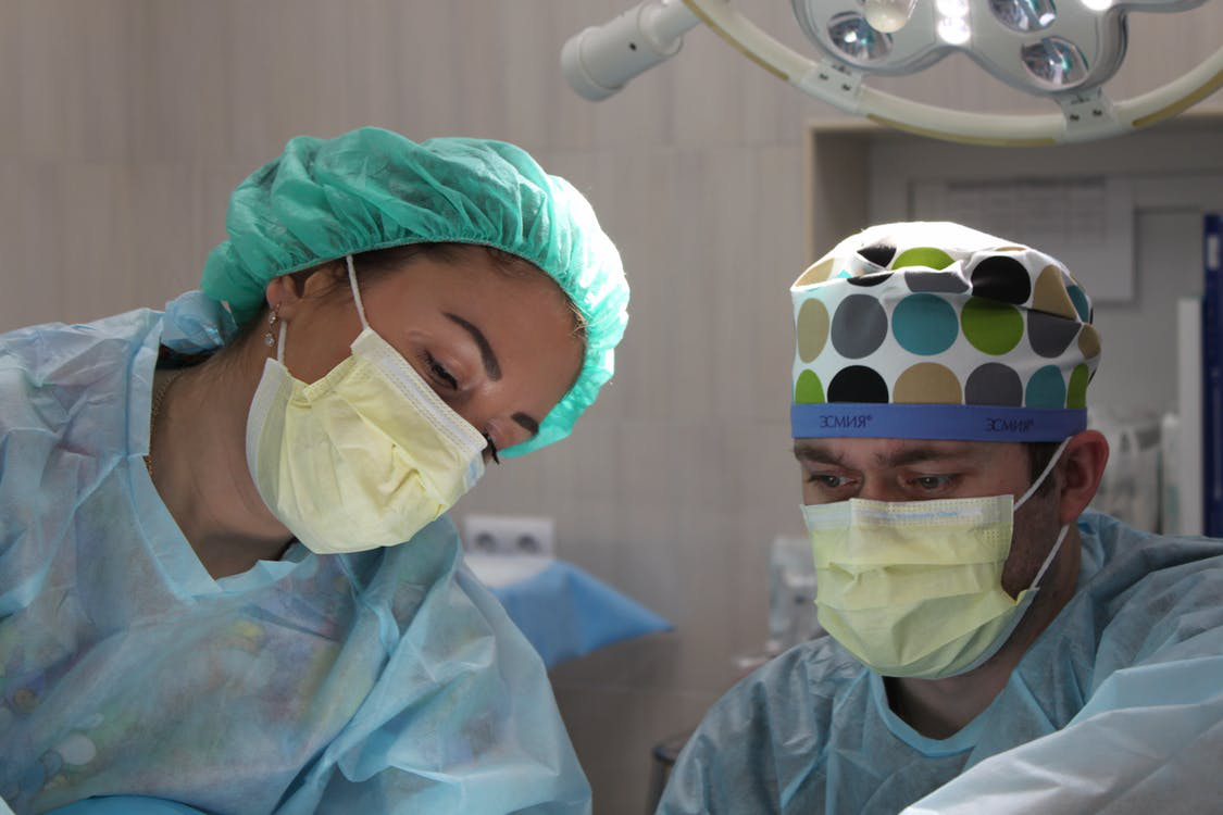 Two female surgeons during surgery