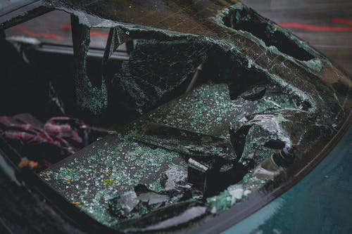 A car with a broken windshield