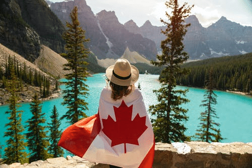 a woman wearing the Canadian flag