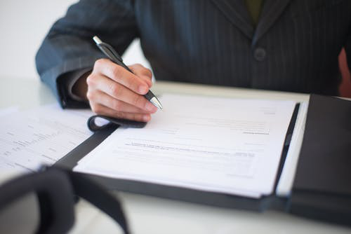  a person signing an agreement