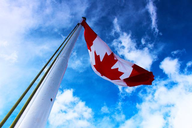 Closeup of the Canadian flag on a pole