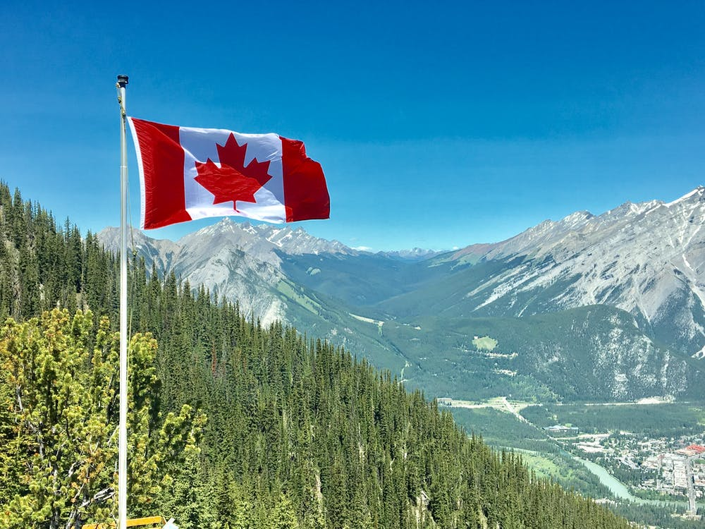 Mountain view with a Canadian flag