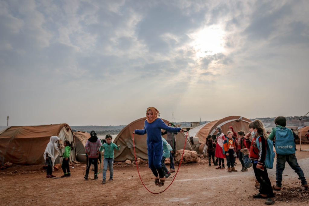 Children playing at a refugee camp.