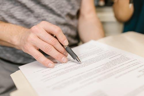 A lawyer drafting a prenuptial agreement