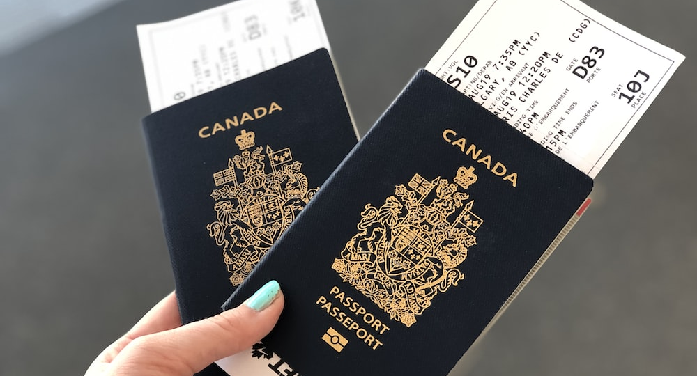 A person holding Canadian passports